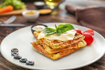 Tasty squash waffles on plate