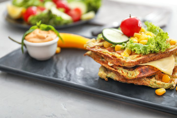 Tasty squash waffles on plate