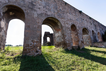 Fototapeta na wymiar ancient Roman aqueduct of the 2nd century B.C. in Rome
