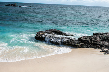 Water washing over a rock