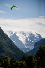 Fototapeta na wymiar paragliding in the mountains