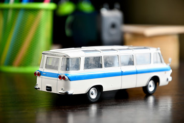 Model bus ZIL 118 "Youth" on the desk. Back to school.