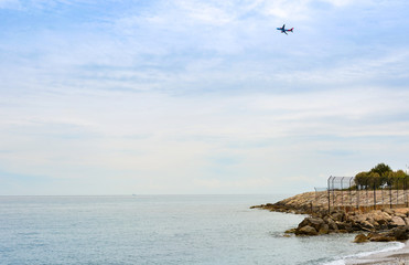 Panorama of the French Riviera with flying plane