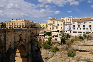 Obraz na płótnie Canvas Ronda, Spain at Puente Nuevo Bridge in sunny october day.