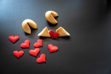 Looking for love in lucky cookies, concept of single people needing dating to find love.