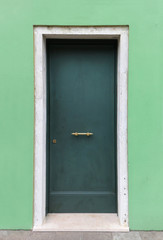 Closed green door