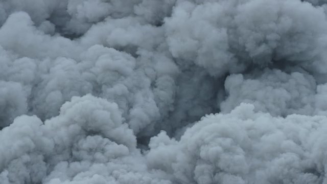Abstract Close Up Slomotion View of Clouds of Smoke Ash and Gas After Vulcanic Eruption. Shot on Red Dragon Camera