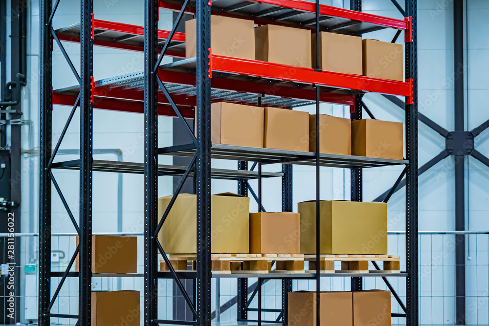 Poster boxes in stock. boxes on pallets on shelves. storage racks with boxes. warehouse's metal constructio