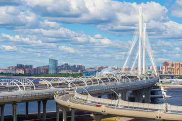 Fototapeta premium Saint-Petersburg. Russia. Vansu bridge through the Petrovsky fairway. St. Petersburg highway panorama. Western high-speed diameter. Neva river. Petersburg bridges. Petersburg roads. Russian cities.