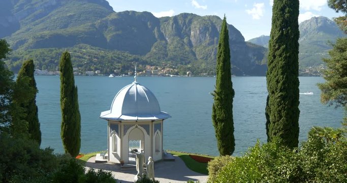 A chapel with cypresses on the garden of the Villa Melzi d’Eril on Lake Como, Italy