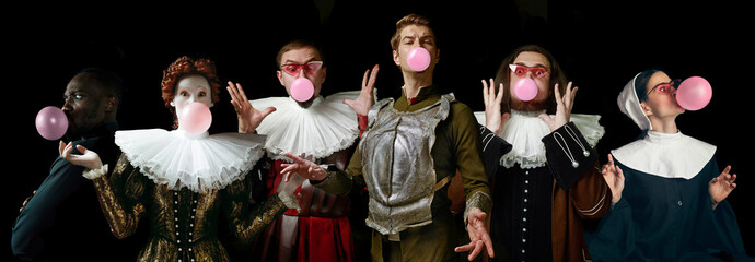 Young people as a medieval grandee on dark studio background. Bubbling up of pink gum. Collage of portraits in retro costume. Human emotions, comparison of eras and facial expressions concept.