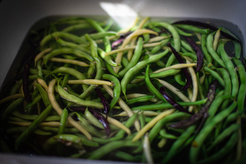whole geen beans in the washing processes before they are cooked