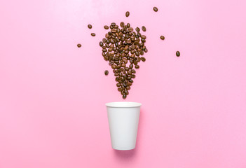 Styrofoam cup and coffee beans