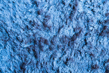 Blue fabric carpet with long pile texture
