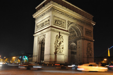 Fototapeta na wymiar Arc De Triomphe at Night in Paris, France