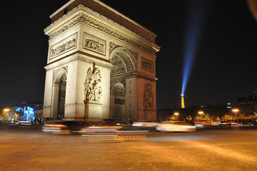 Fototapeta na wymiar Arc De Triomphe at Night in Paris, France
