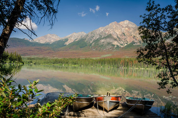 Pyramid Mountain reflecting in Pyramid Lake above the town of Jasper