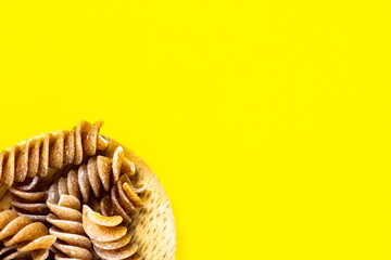  pasta with yellow paper background