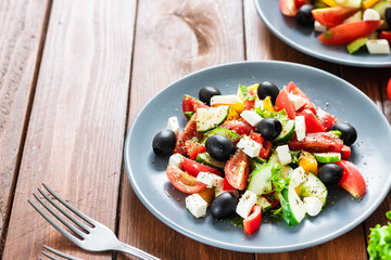 Greek salad with fresh tomatoes, peppers and cucumbers