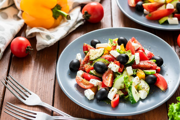 Greek salad with fresh tomatoes, peppers and cucumbers