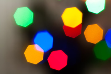 Colourful festive multi-colored circles . Defocused abstract multicolored bokeh lights background.