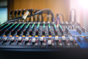Professional mixing console in studio. Used for audio signals modifications to achieve the desired output. 