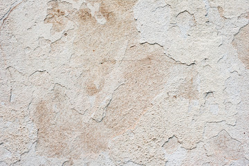 Texture of a concrete wall with cracks and scratches which can be used as a background