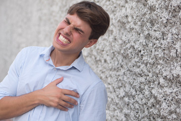 man suffering from heart attack