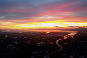 Shot from the sky at dusk in the countryside of Japan