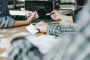 Fototapeta premium Graphic designers work together with computer designing application for mobile phone, Graphic designers concept