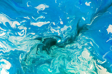 abstract blue paint acrylic pattern texture like marble background, hand painted art marbling like ocean or blue sky