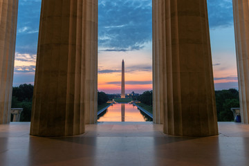Sunrise view at Washington Monument and Reflecting Pool from Lincoln Memorial in Washington, D.C.,...