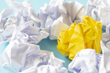 White and yellow paper crumpled, concept idea of think different. 
