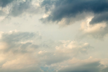Dramatic picturesque colorful skies with cloud and picturesque sunbeams before sunset