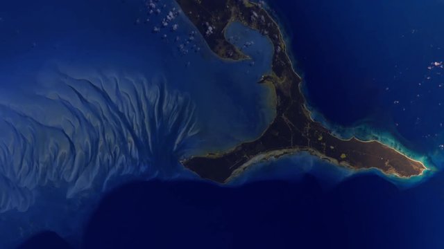 Bahamas Eleuthera island aerial satellite view sunrise animation. Contains public domain image by Nasa
