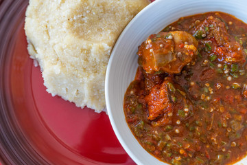 Nigerian Spicy Okro and Pepper stew served with Eba ready to eat
