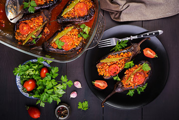 Karniyarik - turkish traditional aubergine eggplant meal. Stuffed eggplants with ground beef and...