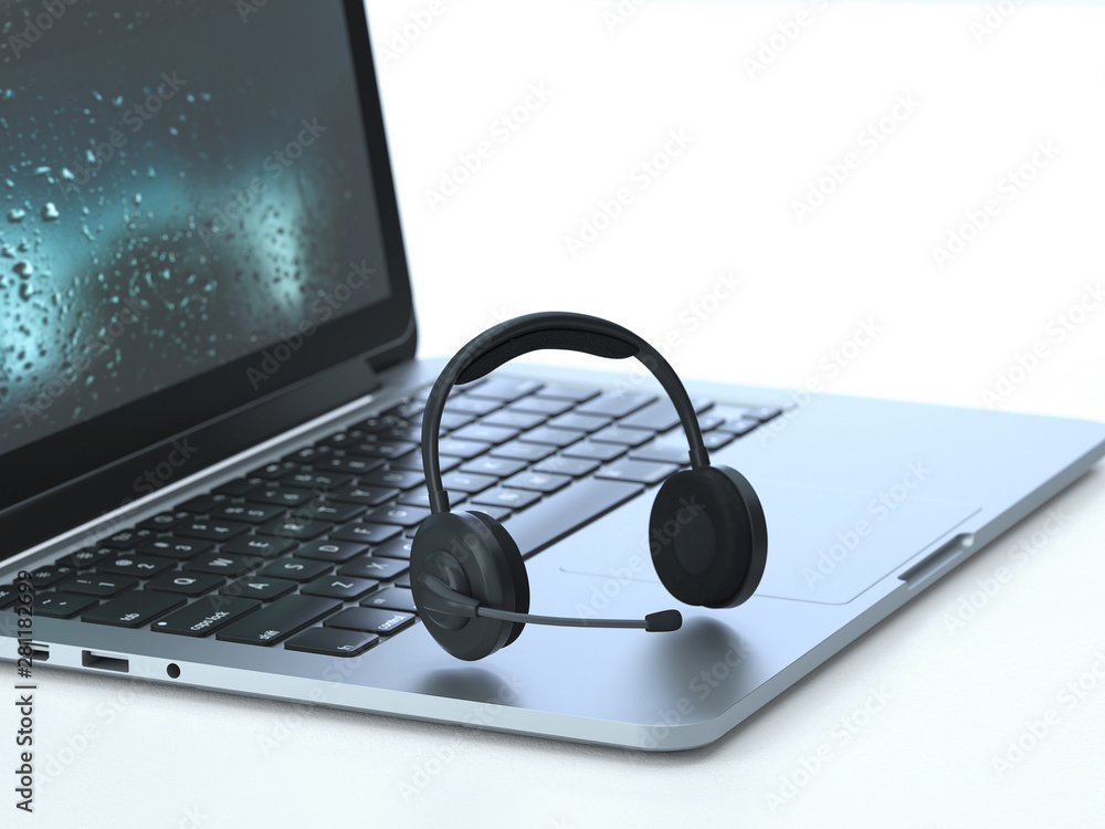 Aufkleber support,headset on the keyboard of a latop, 3d rendering,conceptual image. assistance and support co