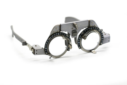 Image of trial frame used in a eye on white background. Glasses