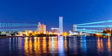 Concept of modern digital city and innovation. Night view of the skyscrapers of the city of Yekaterinburg. Russia.