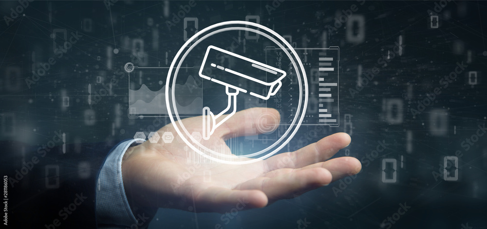 Poster businessman holding security camera system icon and statistics data - 3d rendering