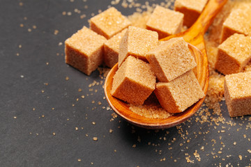 Rock sugar on dark background close up