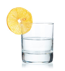  tequila shot with juicy lemon slices  on white background
