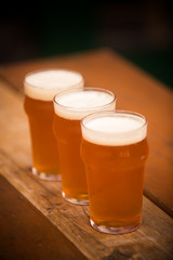 Three pints of beer in a row