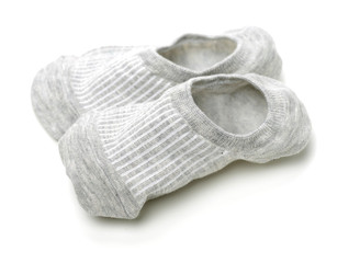 Invisible ladies shoes socks in different colors isolated on white background