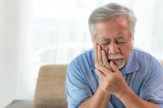 Asian senior man patients Toothache hurts - Elderly patients medical and healthcare concept