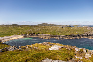 overlook of a sandy bay in Gerrannan  on the isle of lewis in Scotland on a sunny day