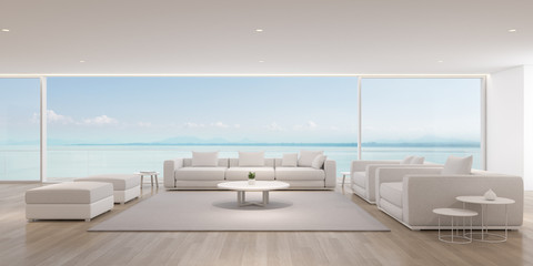 Fototapeta na wymiar Perspective of modern luxury living room with white sofa on sea view background,Relaxation idea of family vacation, architecture idea of large window system - 3D rendering.
