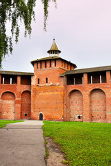 View on red brick wall and tower of Kolomna Kremlin, that was built in 1525-1531 by order of Tsar Vasily III. Russian history, sightseeing, ancient architecture. Vertical
