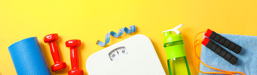 Flat lay composition with loss weigh accessories on color background